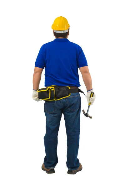 バックビュー保護手袋付きブルーシャツの建設男の労働者 クリッピングパスと白の背景に隔離されたツールベルト手保持ハンマーとヘルメット — ストック写真