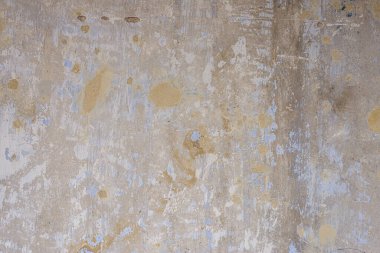 Beton çatlamış arka planı olan eski harabeler.