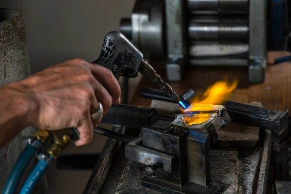 Melting a Silver Ingot in crucible with blowtorch; — Stock Photo, Image