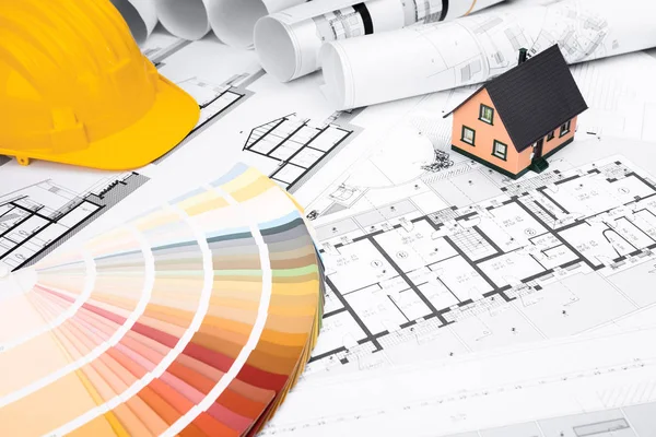 Construction plans with Colors Palette and Miniature House — Stock Photo, Image