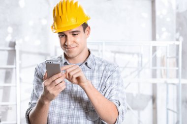 Smiling friendly architect, engineer or builder