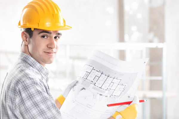 Architect or structural engineer with blueprint