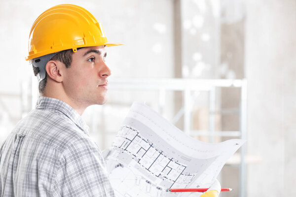 Architect or structural engineer with blueprint