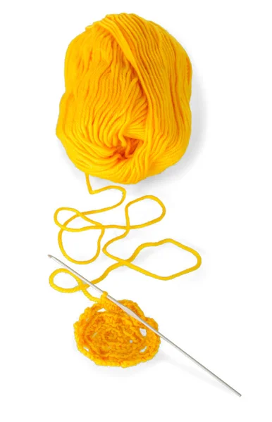 Hank of yellow wool yarn and crochet the product isolated on white — Stock Photo, Image