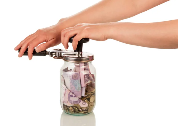 Female hands close jar with money isolated on white — Stock Photo, Image