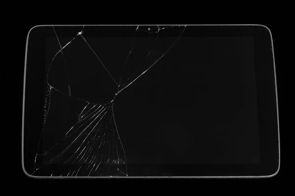 Broken tablet isolated on black background. — 스톡 사진