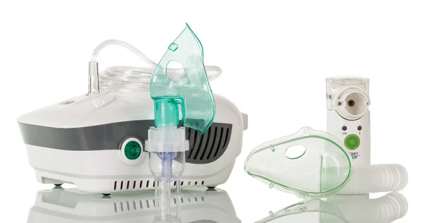 Compressor and ultrasonic nebulizers are isolated on white — Stock Photo, Image