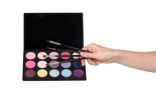 A palette of colorful eye shadow and make-up brushes. — Stock Photo, Image