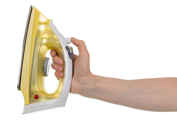 Steam iron in a female hand — 스톡 사진