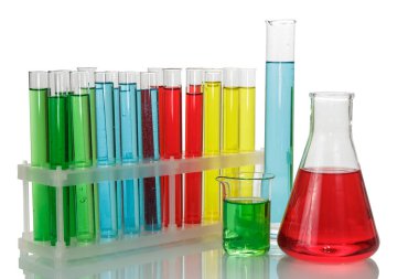 Test tubes with colorful liquids in a rack, chemical flask