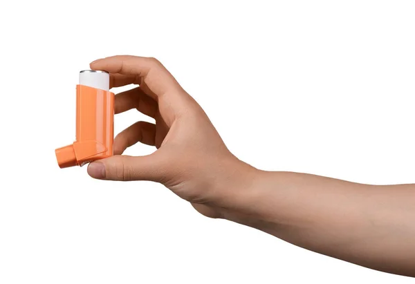 Kleine inhalator in een vrouwelijke hand, geïsoleerd op wit — Stockfoto