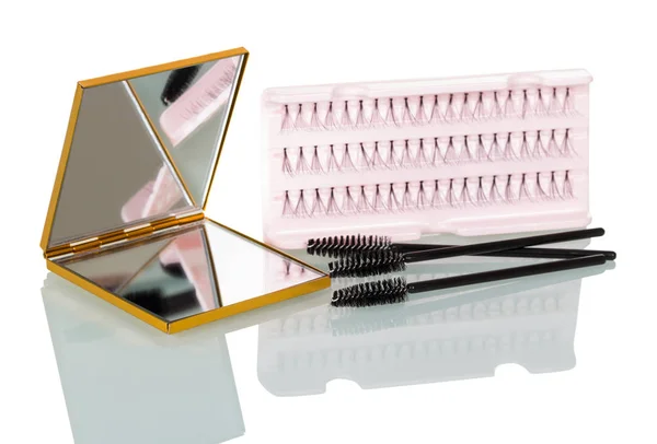 A set of false eyelashes bunches, brush for applying mascara — 图库照片
