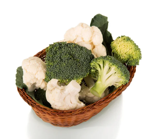 Ripe inflorescences of broccoli and cauliflower in basket — Stok fotoğraf