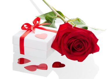 Bright red rose and box with gift isolated on white background