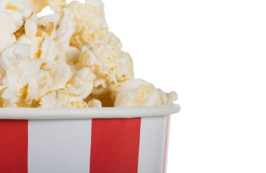 Tasty popcorn in box close up isolated on white.