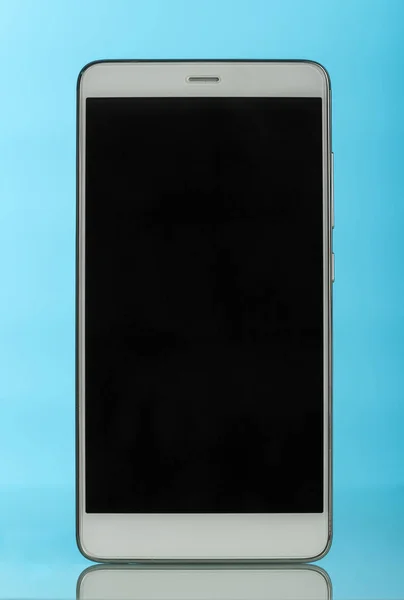 A modern smartphone with touch screen on blue background.