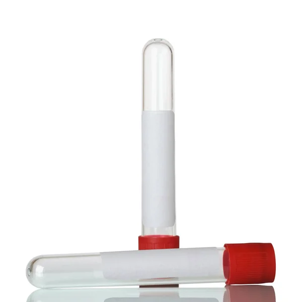 Vakuové trubice pro odběr krve izolované na bílém. — Stock fotografie
