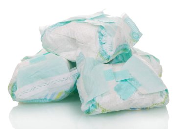 Used disposable diapers close-up isolated on white. clipart