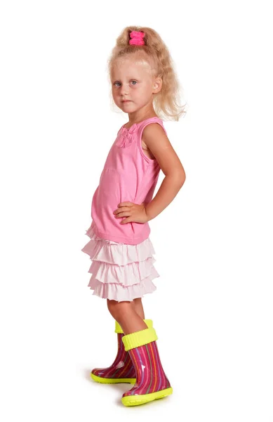 Menina em botas de borracha isolado no branco — Fotografia de Stock