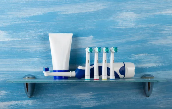 Electric Brush Replaceable Nozzles Whole Family Toothpaste Glass Shelf — Stock Photo, Image
