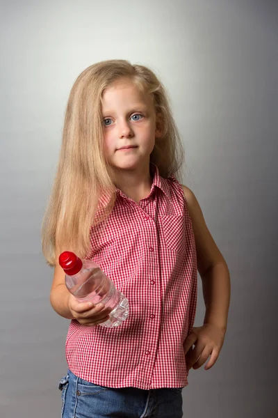 Charming Small Girl Long Hair Holds Bottle Water Gray Background — Stock Photo, Image