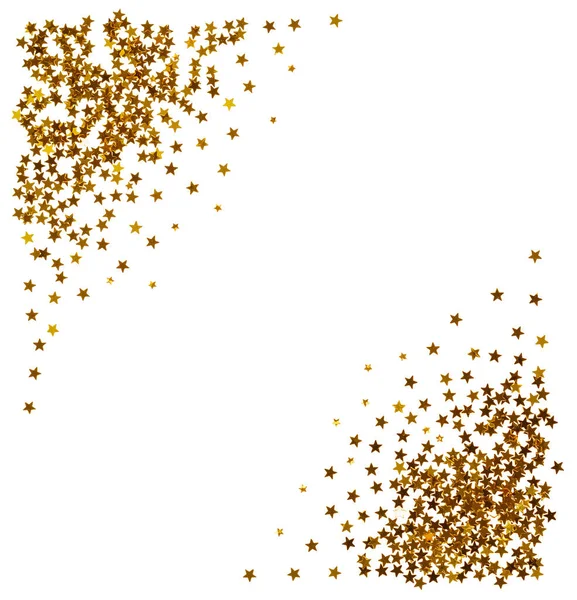 Состав маленьких золотых звезд, выделенных на белом — стоковое фото