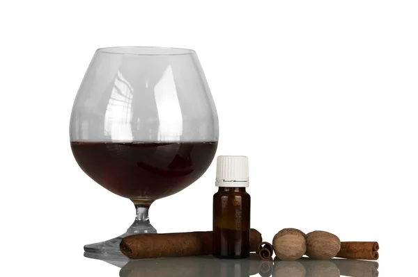 Glass with alcohol and cigar, liquid for smoking with aroma — Stok fotoğraf