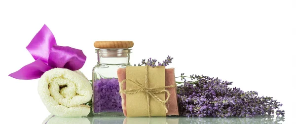 Sea salt with lavender scent, handmade soap and towel isolated on white — Stock Photo, Image