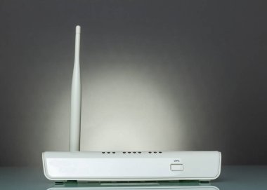 A router with WPS function on gray clipart