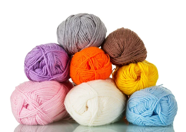 Skeins of yarn of different colors for needlework isolated on white — Stock fotografie