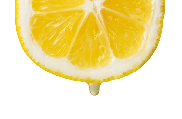 Juicy slice of lemon with juice drop, close-up isolated on white — Stock Photo, Image