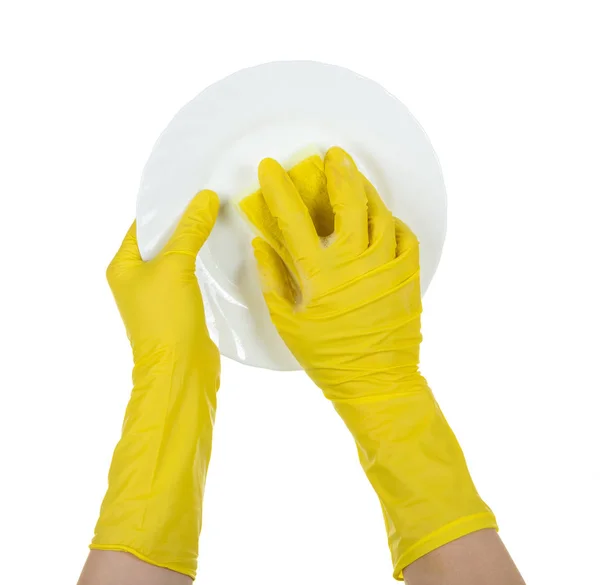 Women's hands with gloves wash sponge plate, isolated on white — Stock Photo, Image