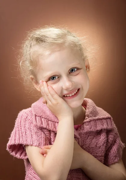 Curly girl blonde with ring on her finger Stock Photo