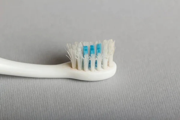 Old Used Toothbrush Grey Background Close — Stock Photo, Image