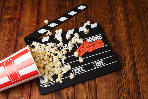 Loose Popcorn Striped Box Movie Tickets Movie Clapper Wooden Background — Stock Photo, Image