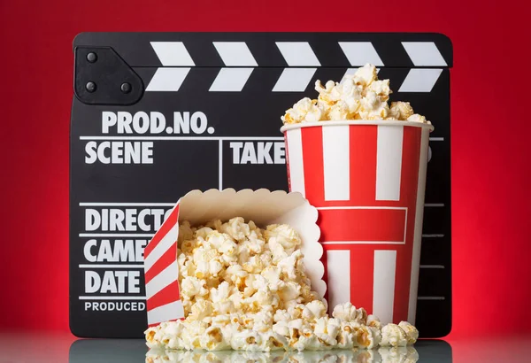 Popcorn Boxes Clapper Board Red Background — Stock Photo, Image