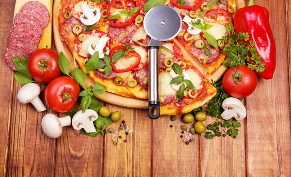 Pizza Salami Mushrooms Vegetables Knife Wheel Background Dark Wood — Stock Photo, Image