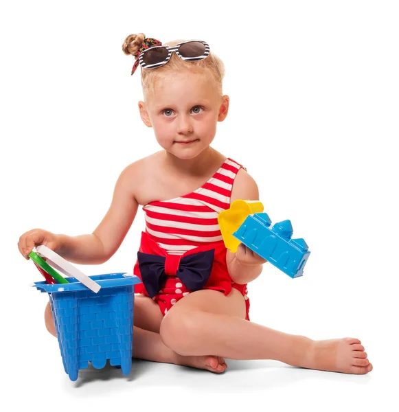 Seated Little Blond Girl Bathing Suit Sunglasses Toys Isolated White — Stock Photo, Image