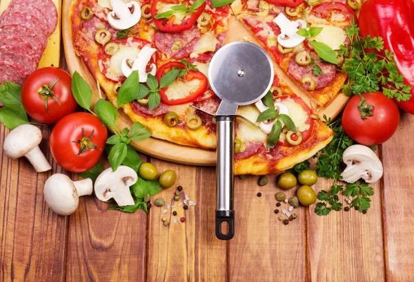 Pizza Salami Mushrooms Peppers Cheese Olives Knife Wheel Background Dark — Stock Photo, Image