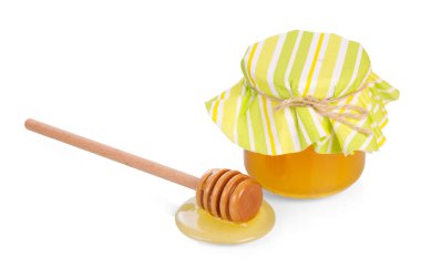 Beyaz bir arka planda izole edilmiş bal kavanozu ve ahşap kaplama.