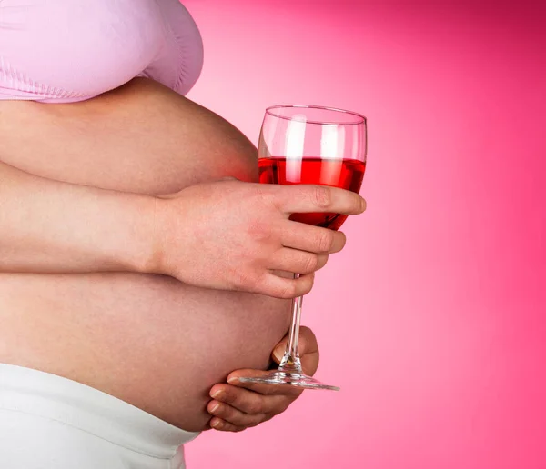 Pregnant Woman Glass Red Wine Hand Pink Background — Stock Photo, Image