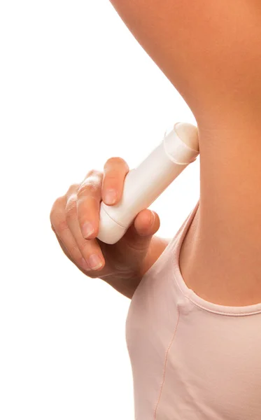 Een Onbekende Vrouw Gebruikt Een Droge Deodorant Een Witte Achtergrond — Stockfoto