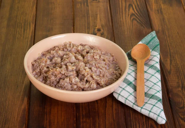 Uma Tigela Mingau Cereal Uma Colher Guardanapo Fundo Madeira Escura — Fotografia de Stock