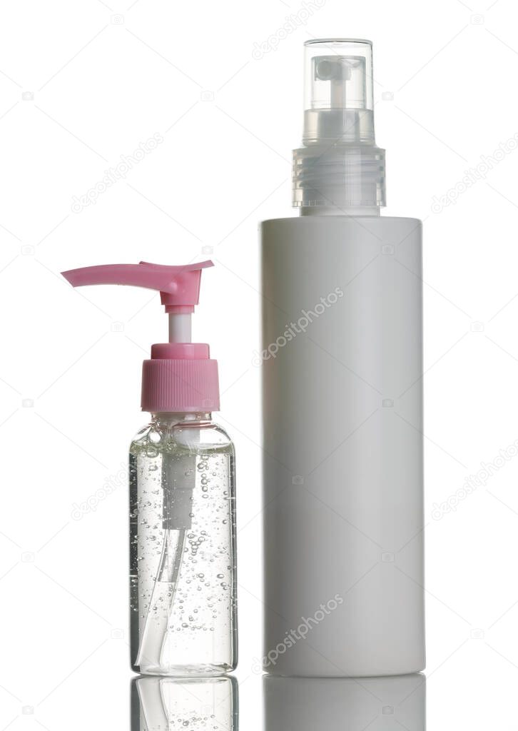 Two sanitizers spray on white plastic bottles isolated on the white background. Coronavirus disinfectants. Alcohol spray bottle.