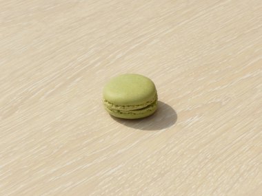 Yeşil macaron ahşap yüzeyde döşeme.