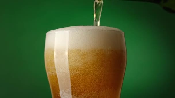 Pour Lager Beer Bottle Glass Foam Bubble Green Background Royalty Free Stock Video