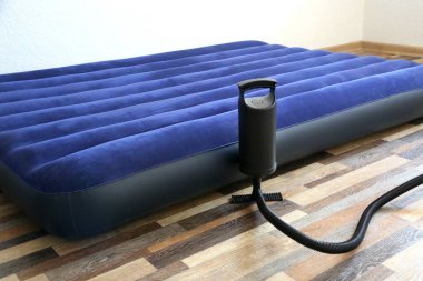 Air bed inflatable mattress and foot pumper good for sleep. Portable and cheap bed. clipart