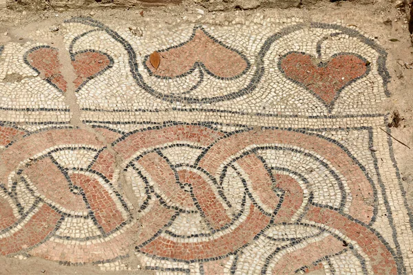 Old roman mosaic floor. Butrint is famous Albanian archaeological center protected under UNESCO as a World Heritage Site. Ancient rotonda is baptist cathedral.