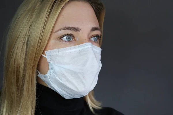 Sick woman feeling bad. Woman wear protective medical mask. Self protection.