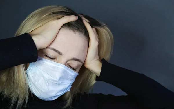 Sick woman feeling bad. Woman wear protective medical mask. Self protection. Coronavirus protection.